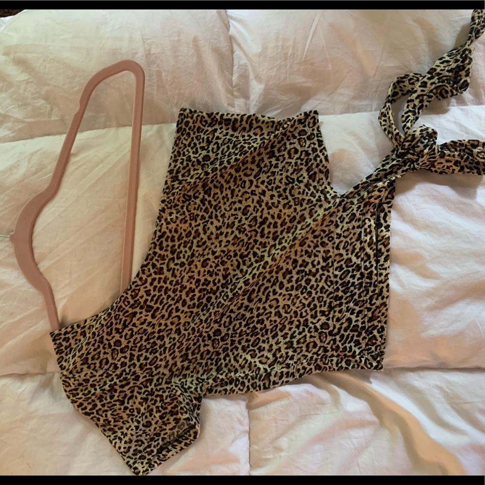Off the shoulder, cut out cheetah top